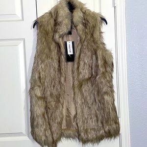 Fur vest ! Never worn! Still with tags